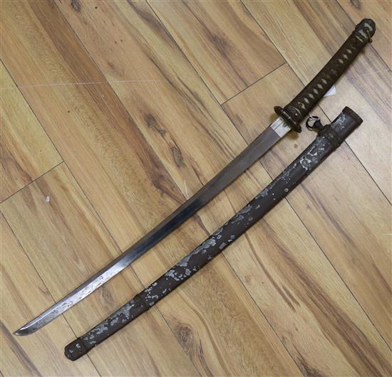 A WW2 Japanese katana with standard mounts, the blade with wavy hamon 98cm